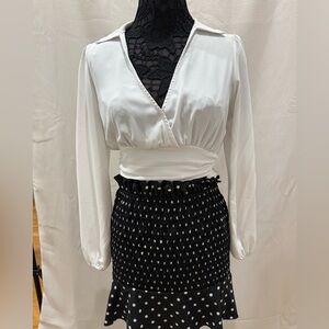 Elegant Black and White Polka Dot Skirt and a white shirt to match!
